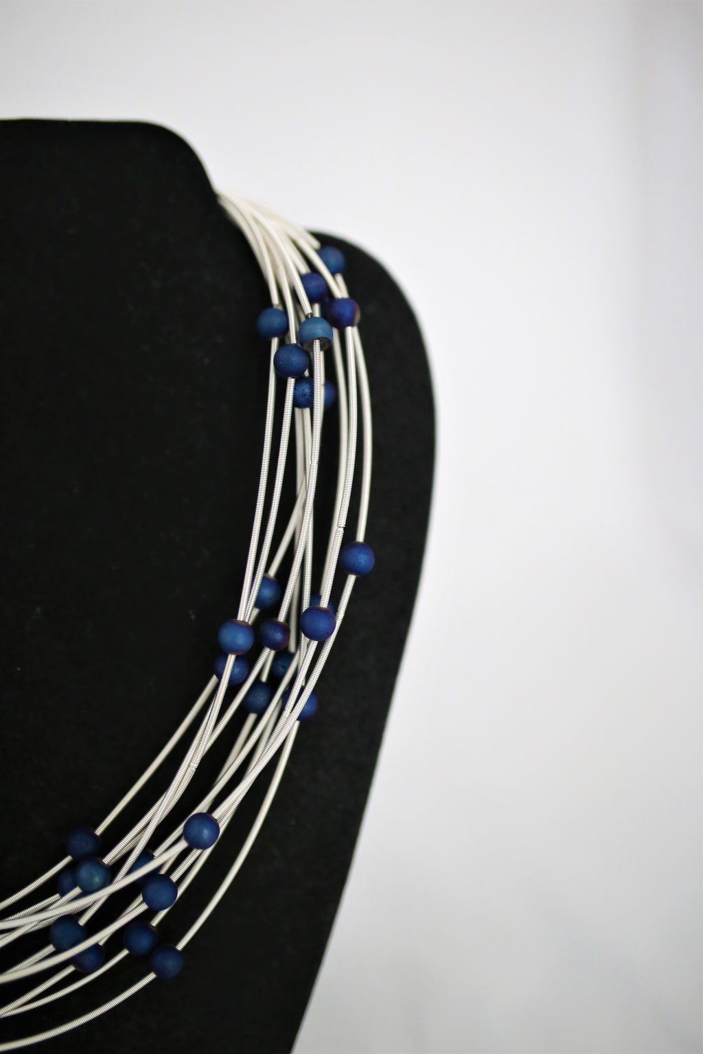 Reclaimed Piano Wire Necklace With Geodes - Blue and White